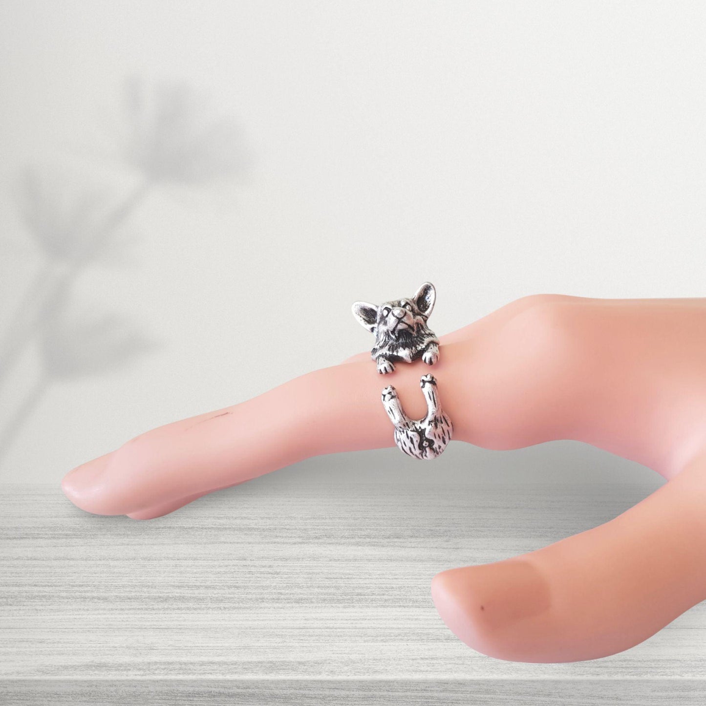 silver coloured corgi dog novelty ring