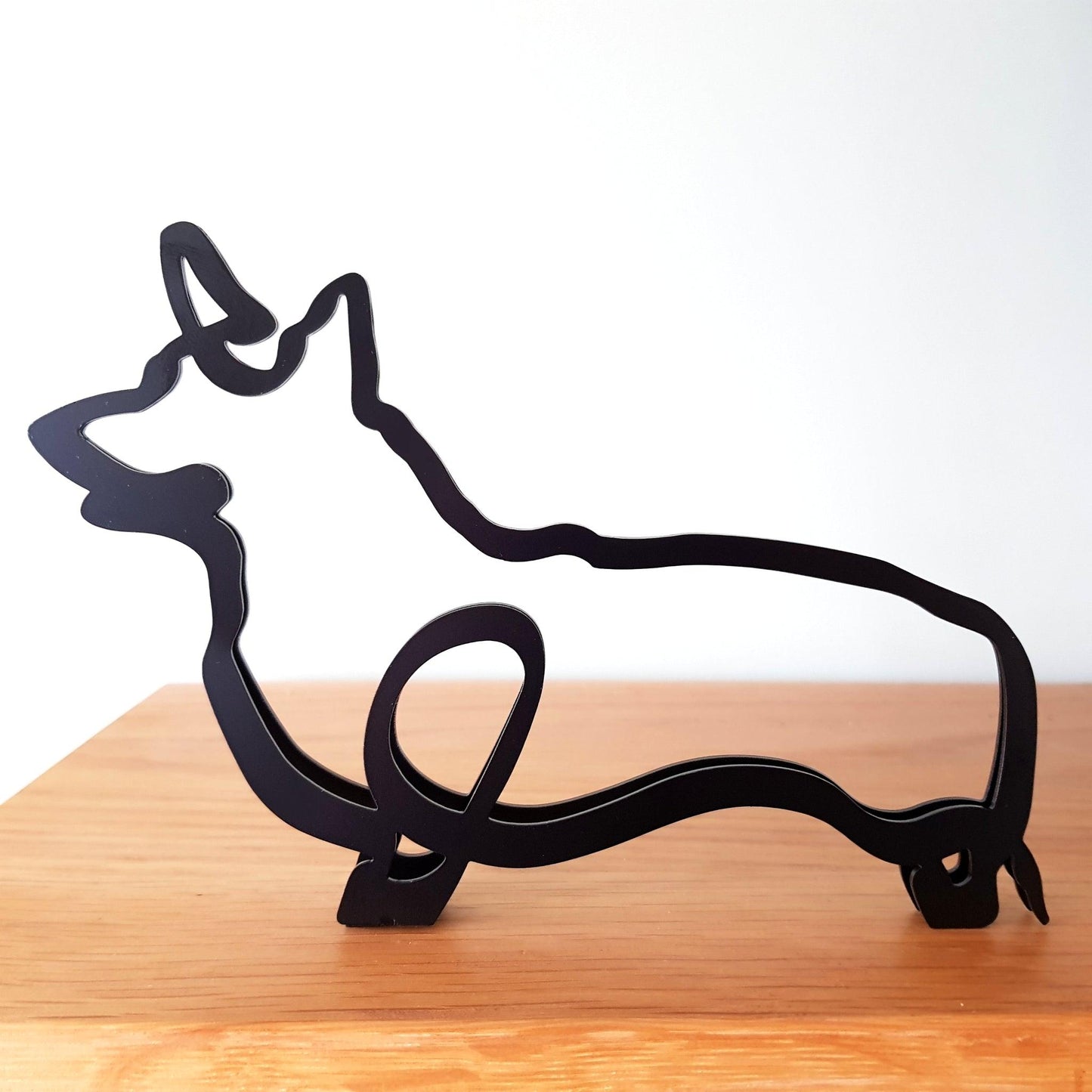 ornamental corgi dog black metal minimalist statue