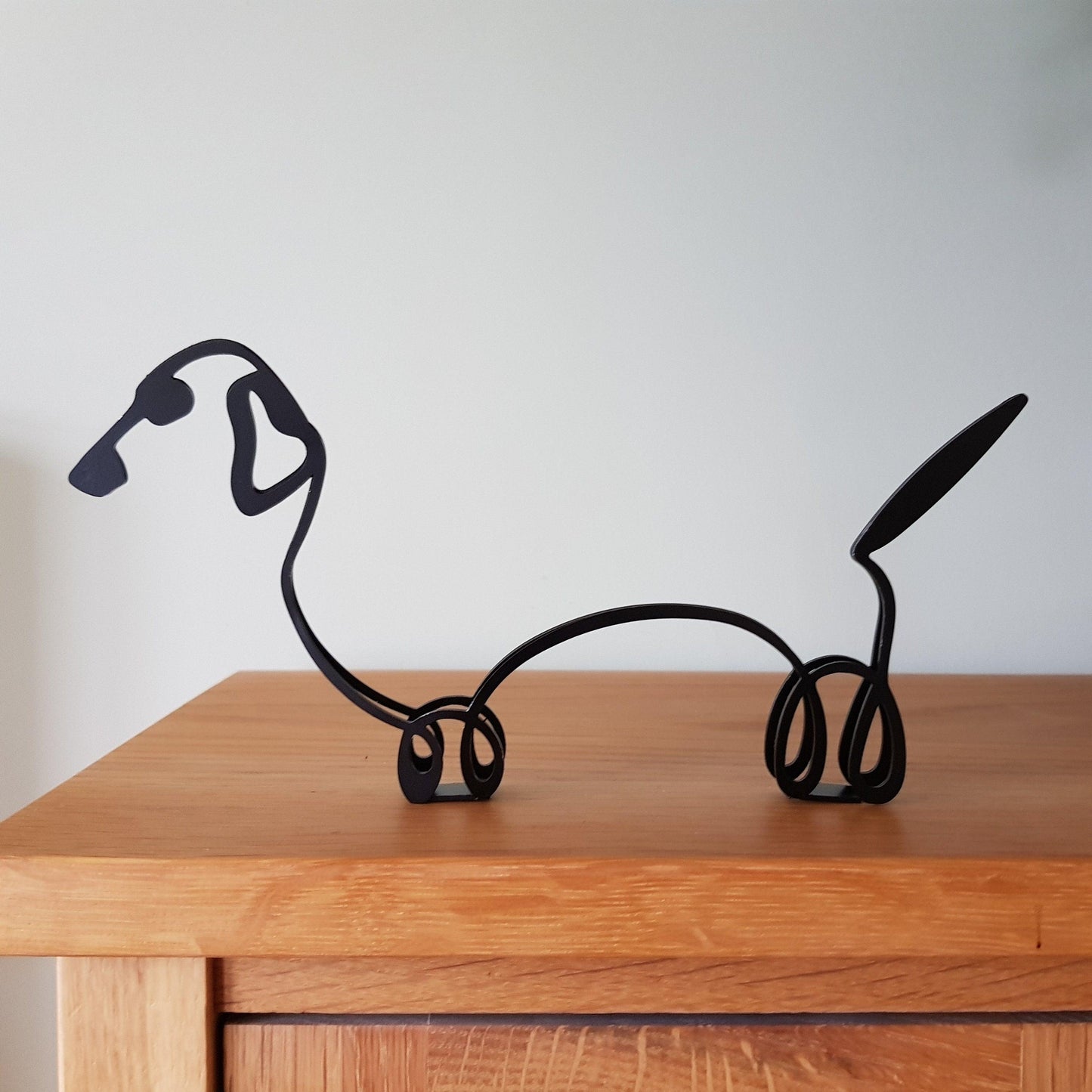 stylish dachshund quirky dog sculpture