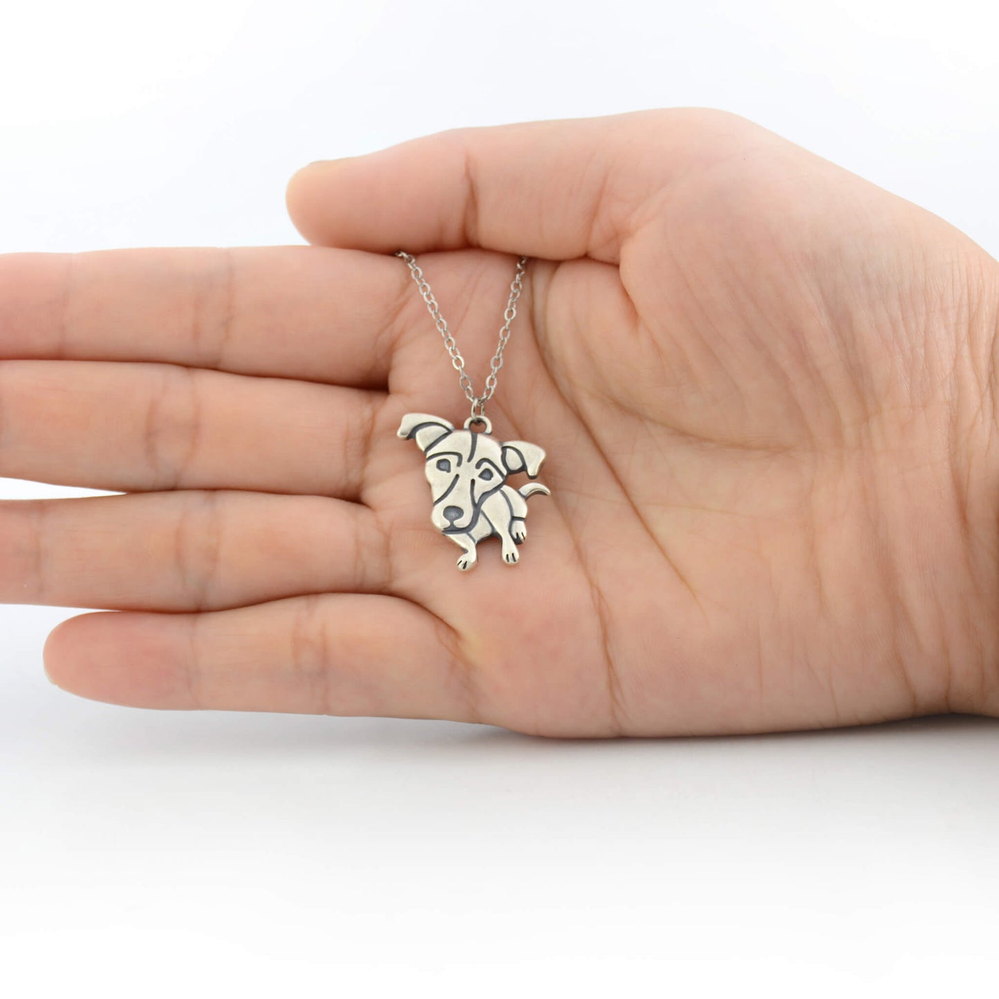 jack russell charm size displayed on hand