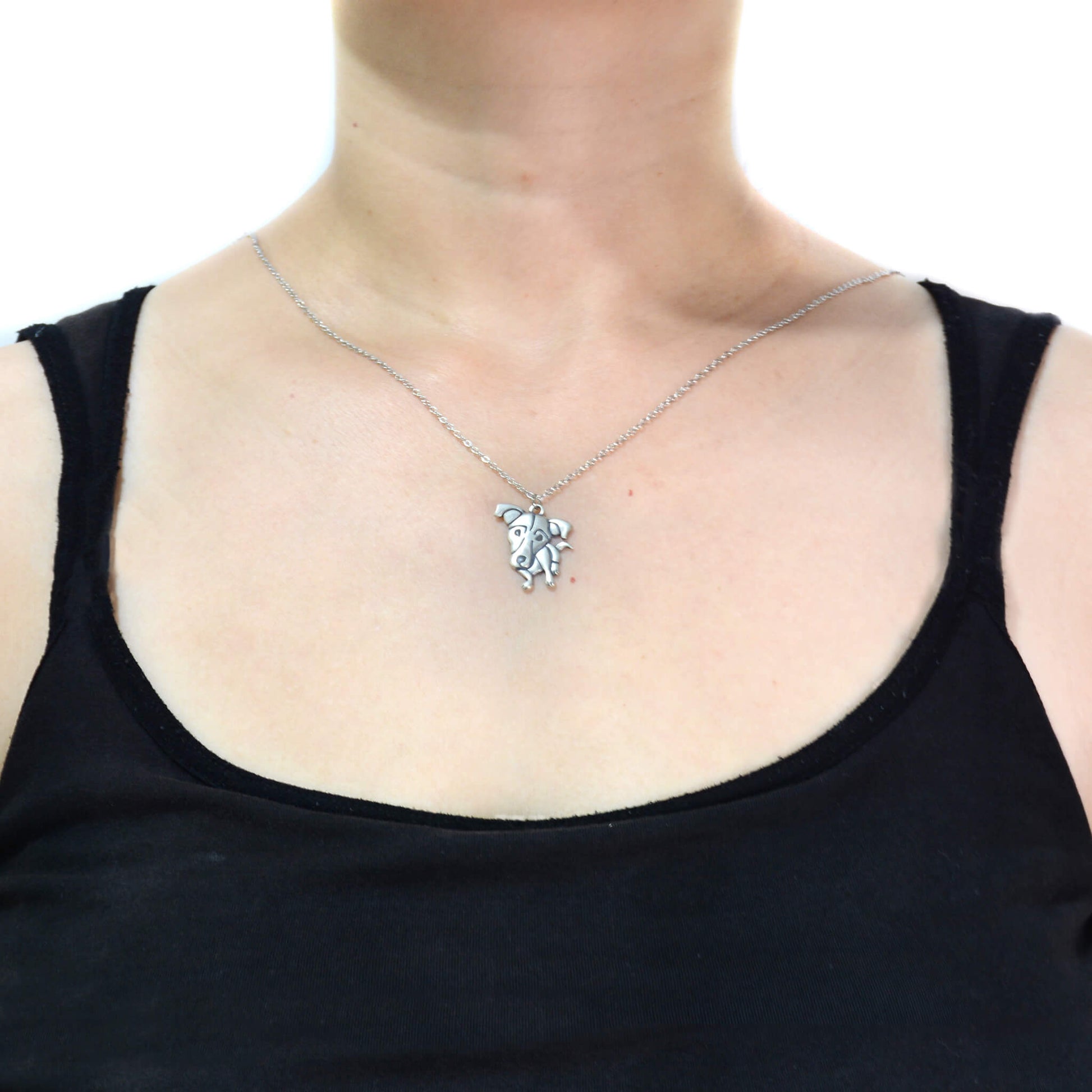 jack russell silver dog charm necklace displayed on woman