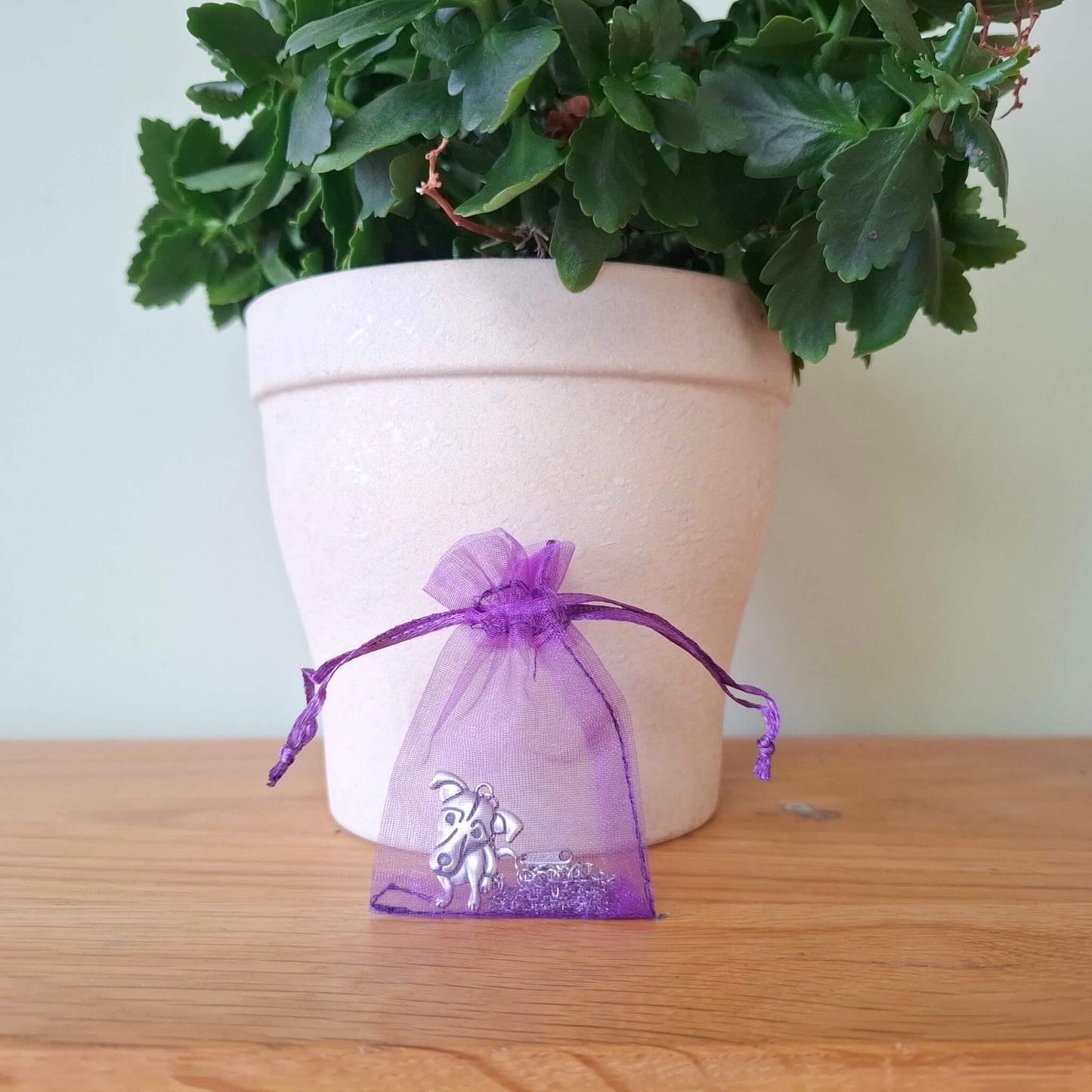jack russell charm necklace in purple organza bag