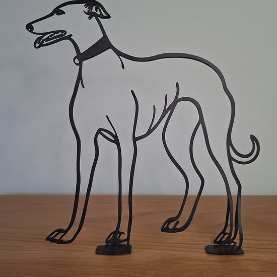 video panning around a greyhound minimalist metal statue 