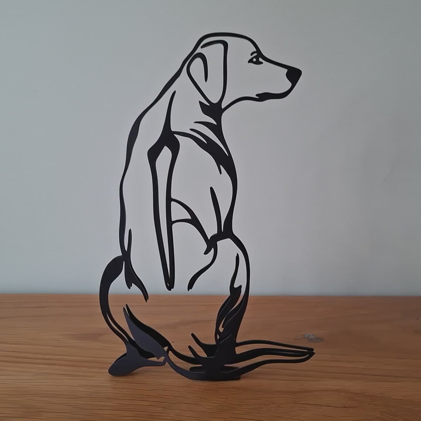 video panning around metal statue of a rhodesian ridgeback statue