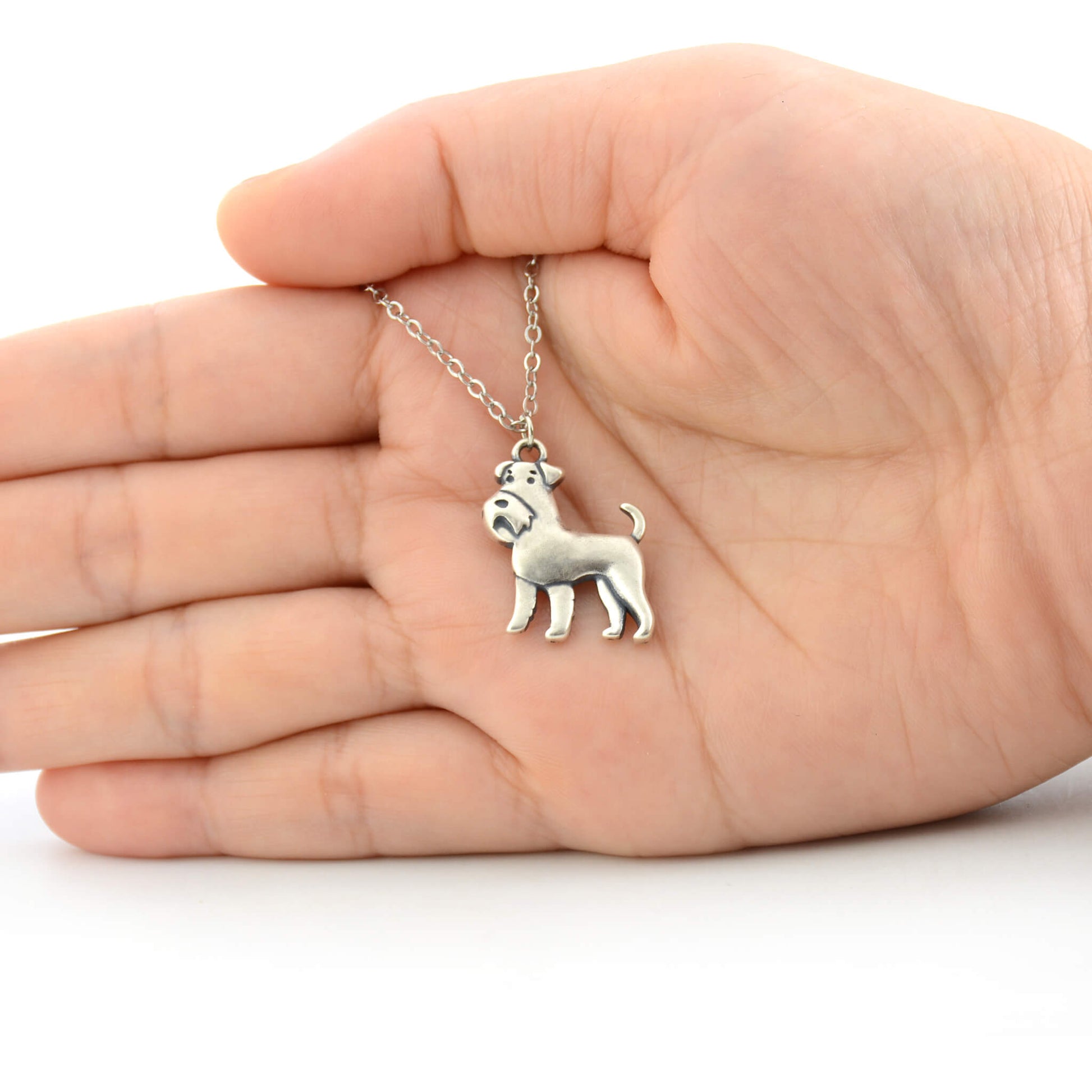 925 silver schnauzer charm size displayed on hand