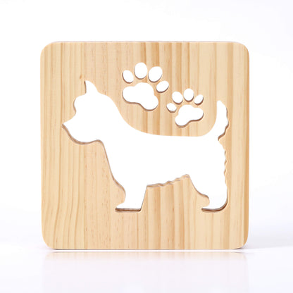 Westie wooden night light switched off, showing the carved dog and paw prints